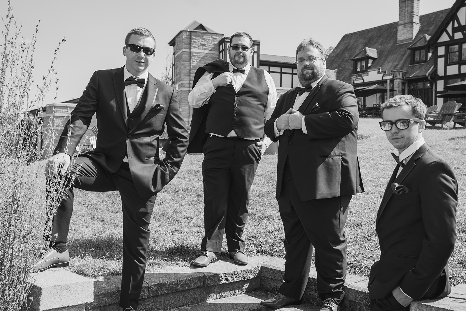 Groom and groomsmen, bridal party portrait, groomsmen pose, classic, dramatic, black and white, wedding portrait, outdoor September wedding ceremony at Punderson Manor Lodge & Conference Center, Newbury Township OH