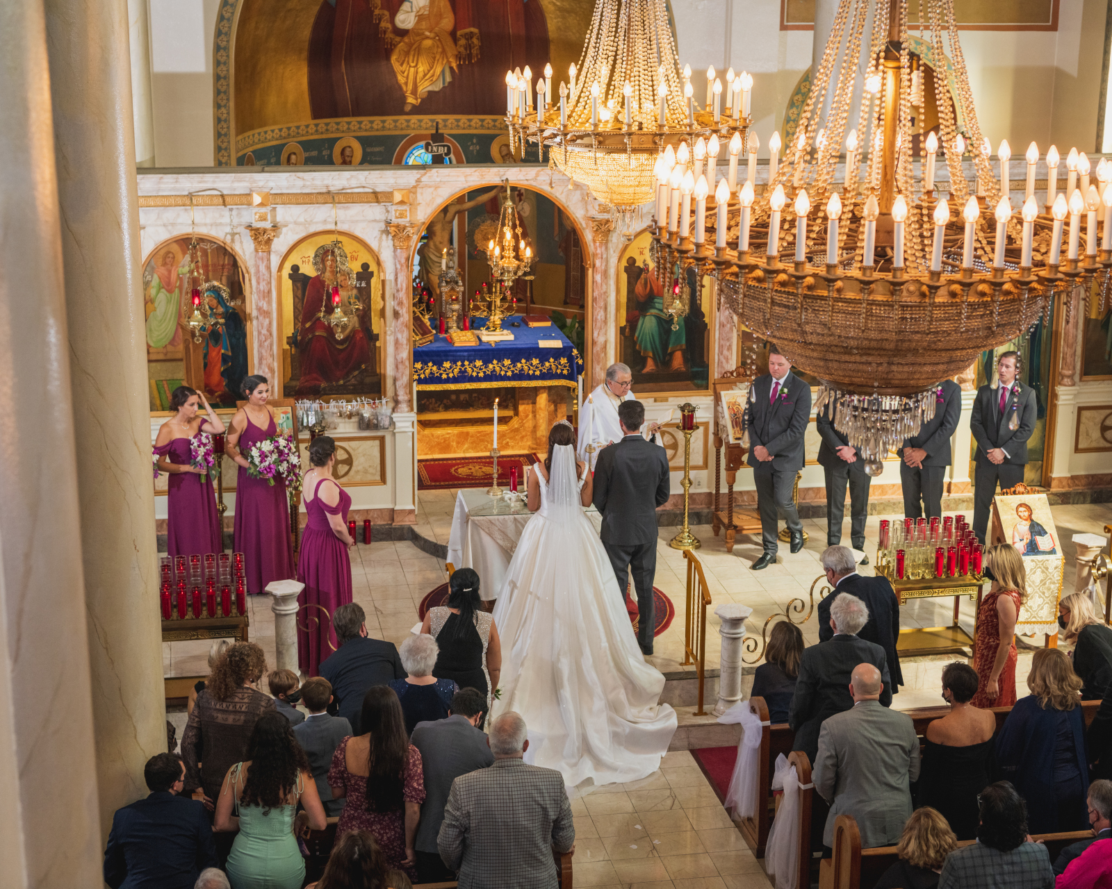 Bride and groom wedding ceremony, long wedding dress train, church, Greek Orthodox wedding ceremony, sweet wedding ceremony at Crocker Park, Westlake OH