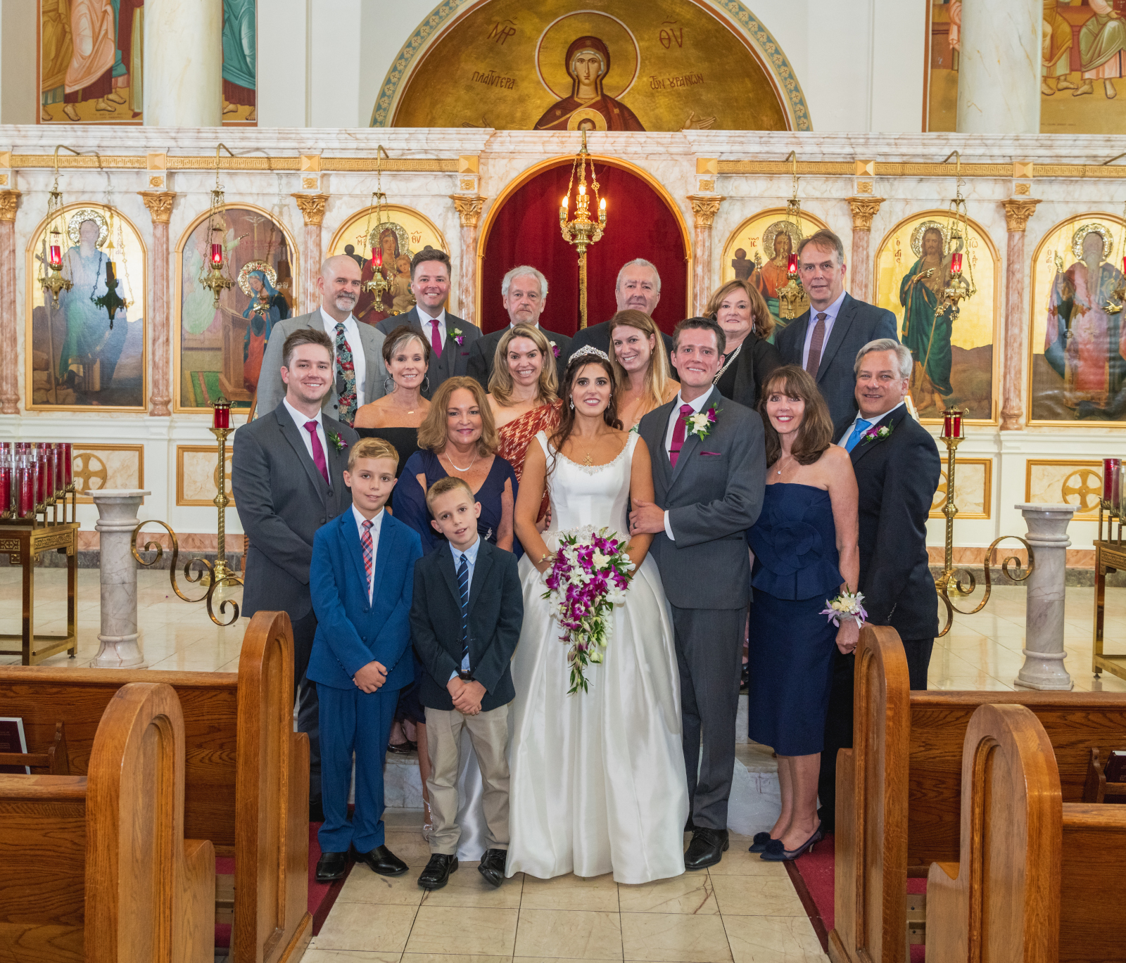 Bride and groom with family, family portrait, church, Greek Orthodox wedding, sweet wedding ceremony at Crocker Park, Westlake OH