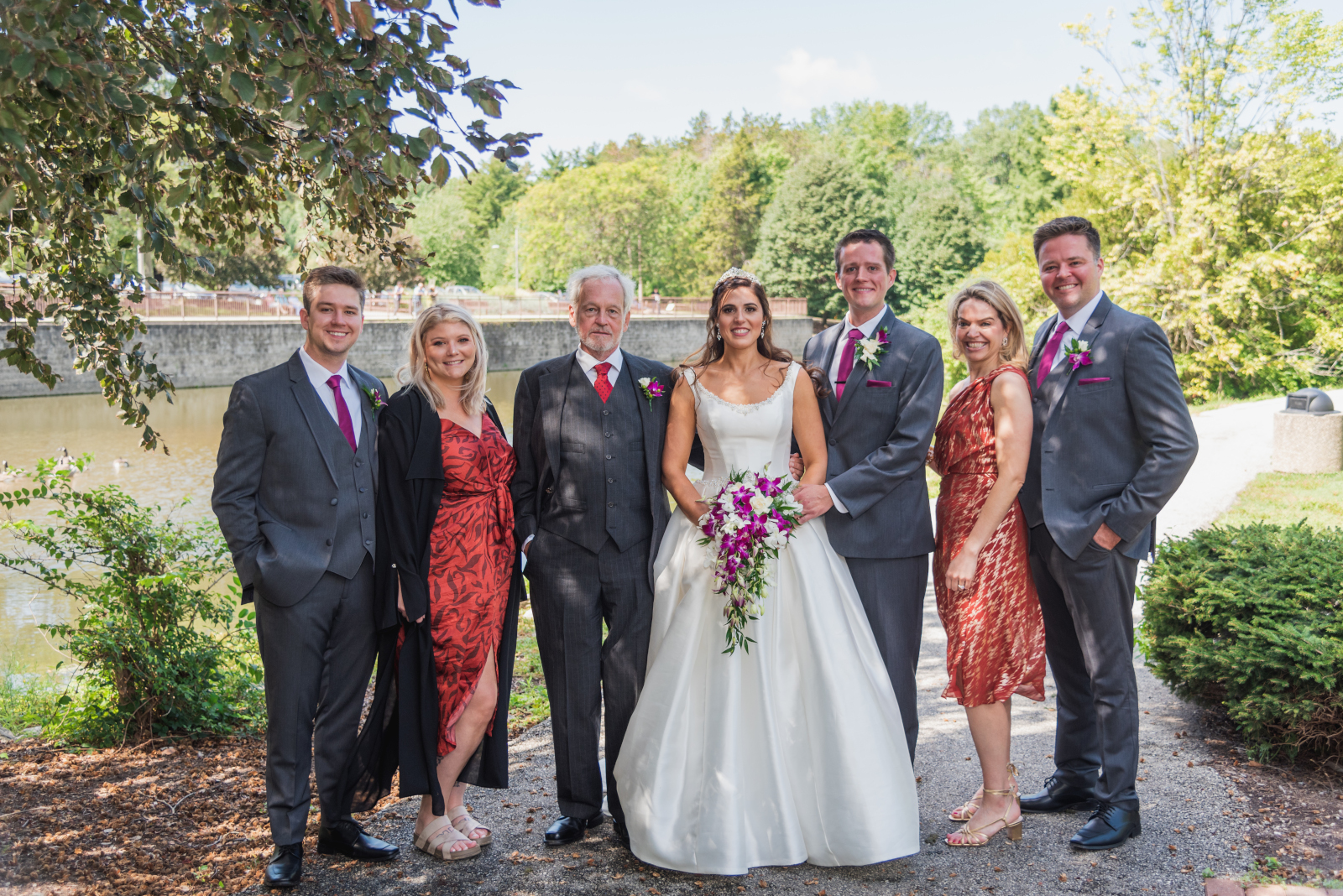 Bride and groom with family and friends, family portrait, groomsmen, trees, nature, pond, sweet wedding ceremony at Crocker Park, Westlake OH