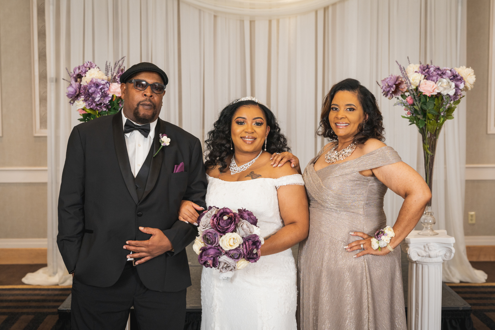 Bride with mom and dad, parents of the bride, family portrait, African American bride, African American wedding, romantic wedding ceremony at Hilton Akron/Fairlawn