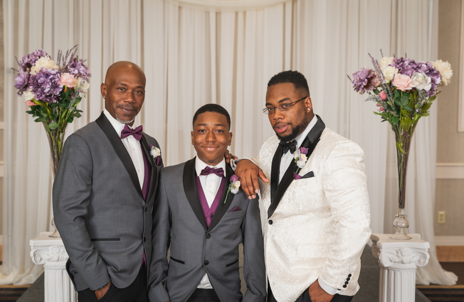 Groom with groomsmen, bridal party portrait, African American wedding, romantic wedding ceremony at Hilton Akron/Fairlawn