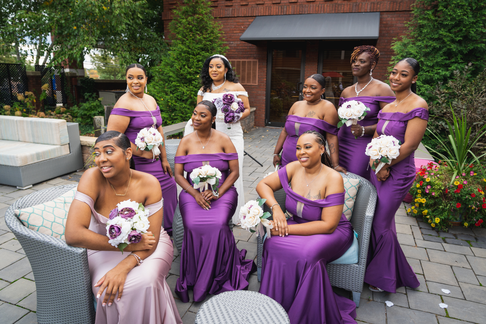 Bride with bridesmaids, bridal party portrait, large bridal party, African American bride, African American wedding, outdoor, trees, courtyard, romantic wedding ceremony at Hilton Akron/Fairlawn
