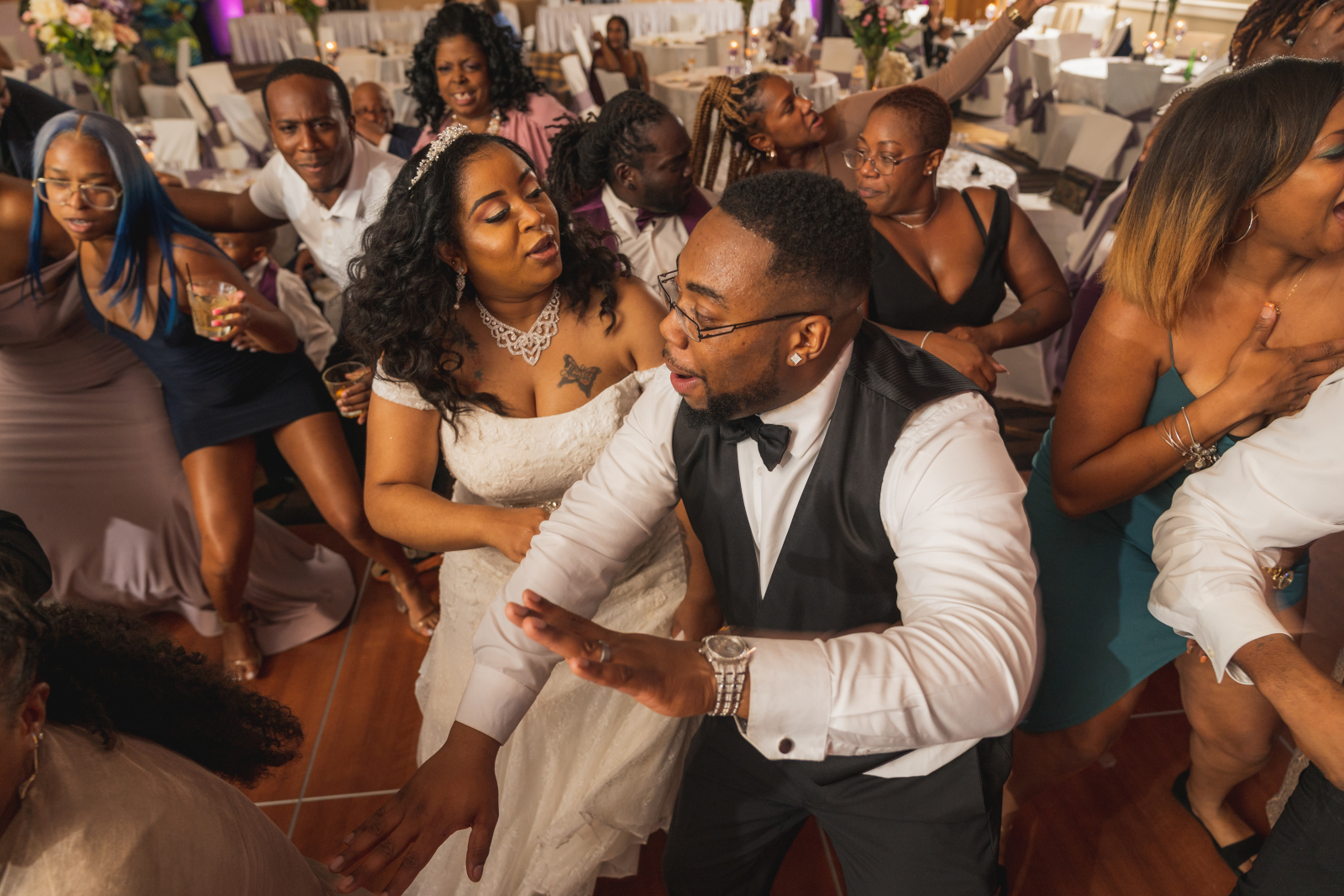 Bride and groom dance, fun, music, wedding DJ, candid, beautiful African American bride, African American wedding, romantic wedding reception at Hilton Akron/Fairlawn