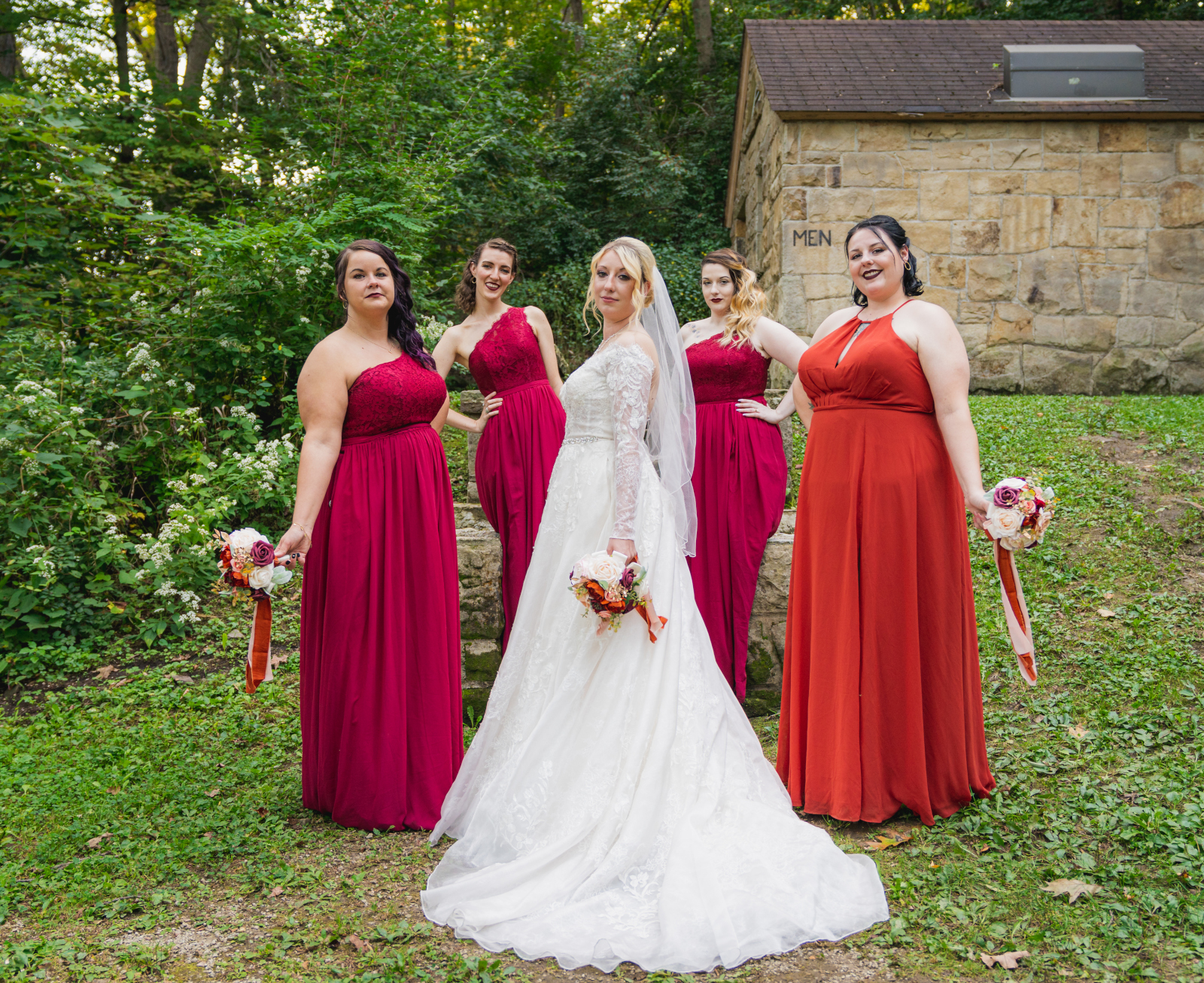 Bride with bridesmaids, bridal party portrait, green, nature, trees, fall wedding, cute outdoor wedding ceremony at Grand Pacific Wedding Gardens