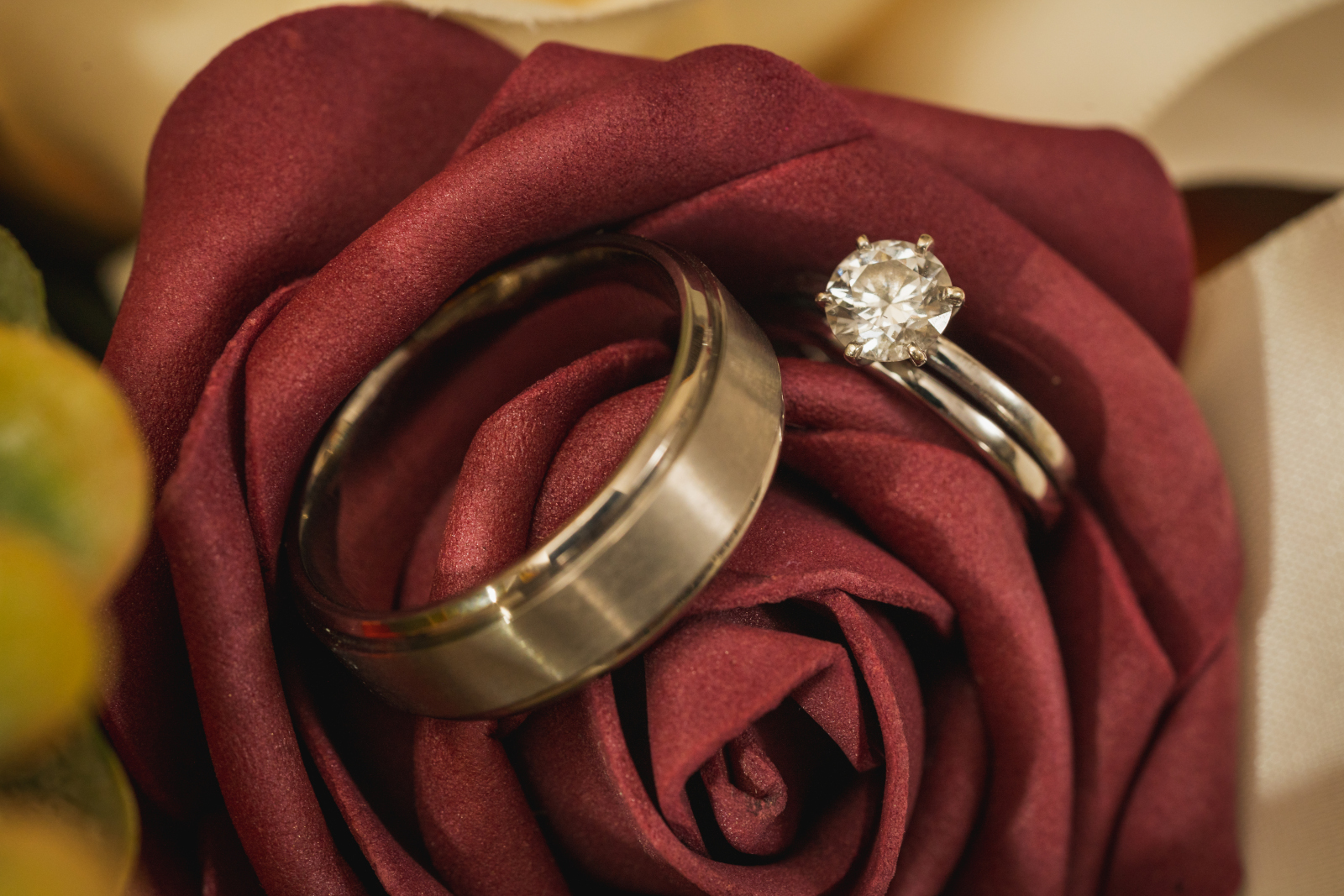 Wedding rings, engagement ring, wedding band, red rose, unique wedding ring photo, fall wedding, cute fall wedding reception at Grand Pacific Wedding Gardens