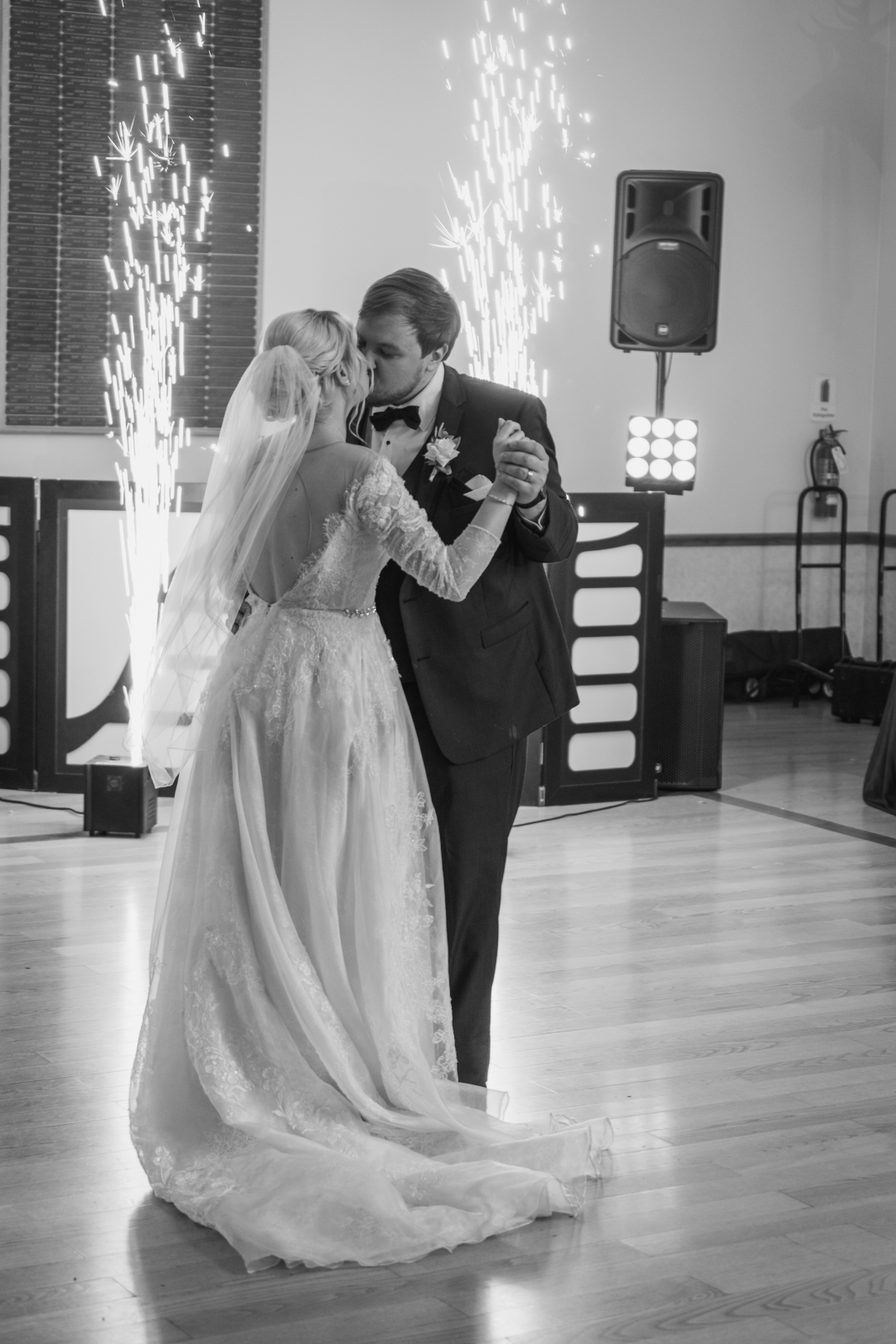 Bride and groom first dance, sweet, romantic, black and white, classic wedding photo, sparks, indoor fireworks, Sparkular cool sparkler machine, fall wedding, cute fall wedding reception at Grand Pacific Wedding Gardens