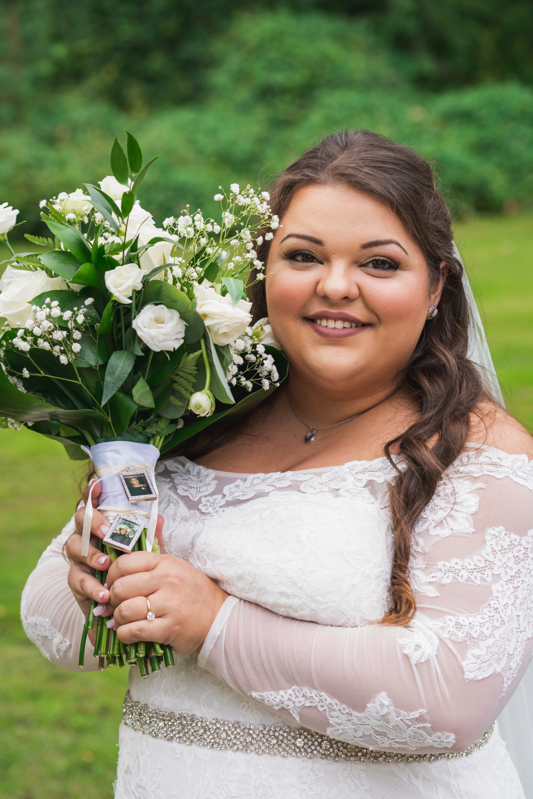 Bride holding bouquet, bridal portrait, smile, green, nature, outdoor September wedding ceremony at Westfall Event Center