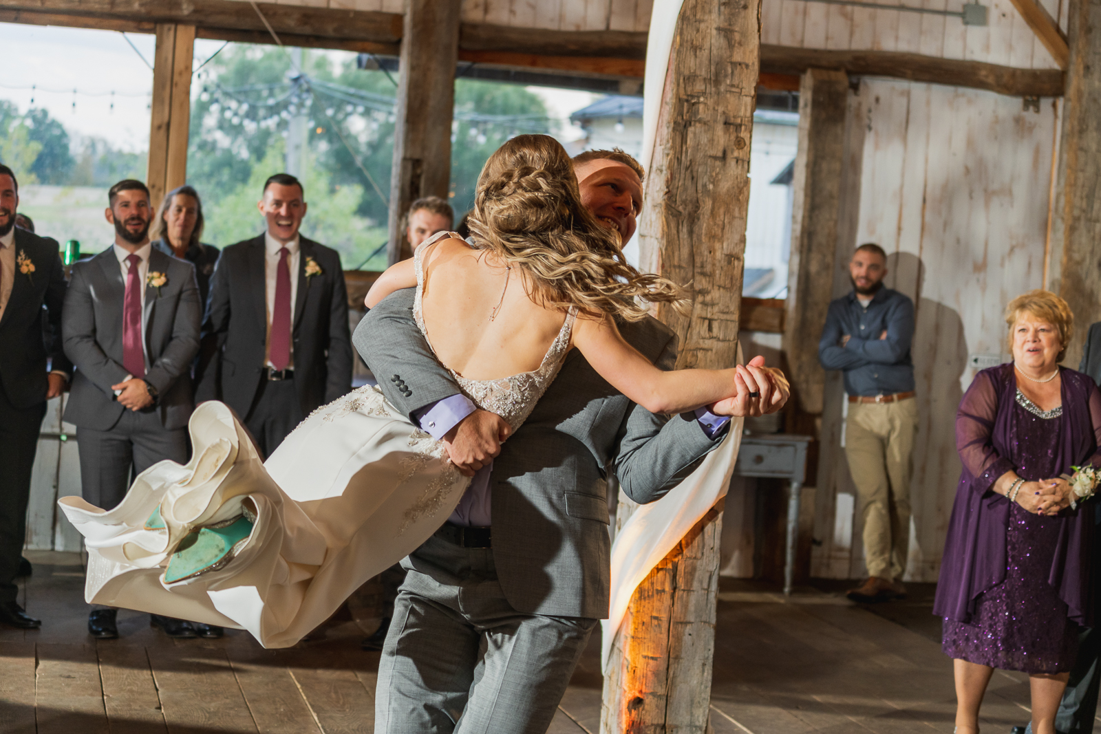 Bride and groom, bridal party entrance, dance, spin, fall wedding, rustic wedding reception at White Birch Barn