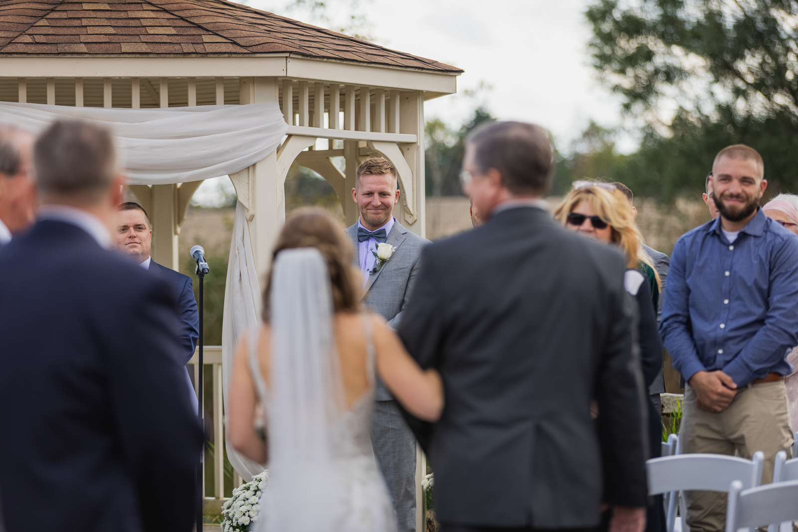 Bride and groom, first look, bridal march, bridal processional, gazebo, fall wedding, rustic outdoor wedding ceremony at White Birch Barn